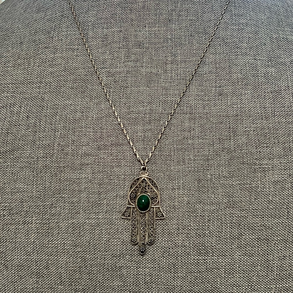 Hamza sterling silver necklace with a green stone